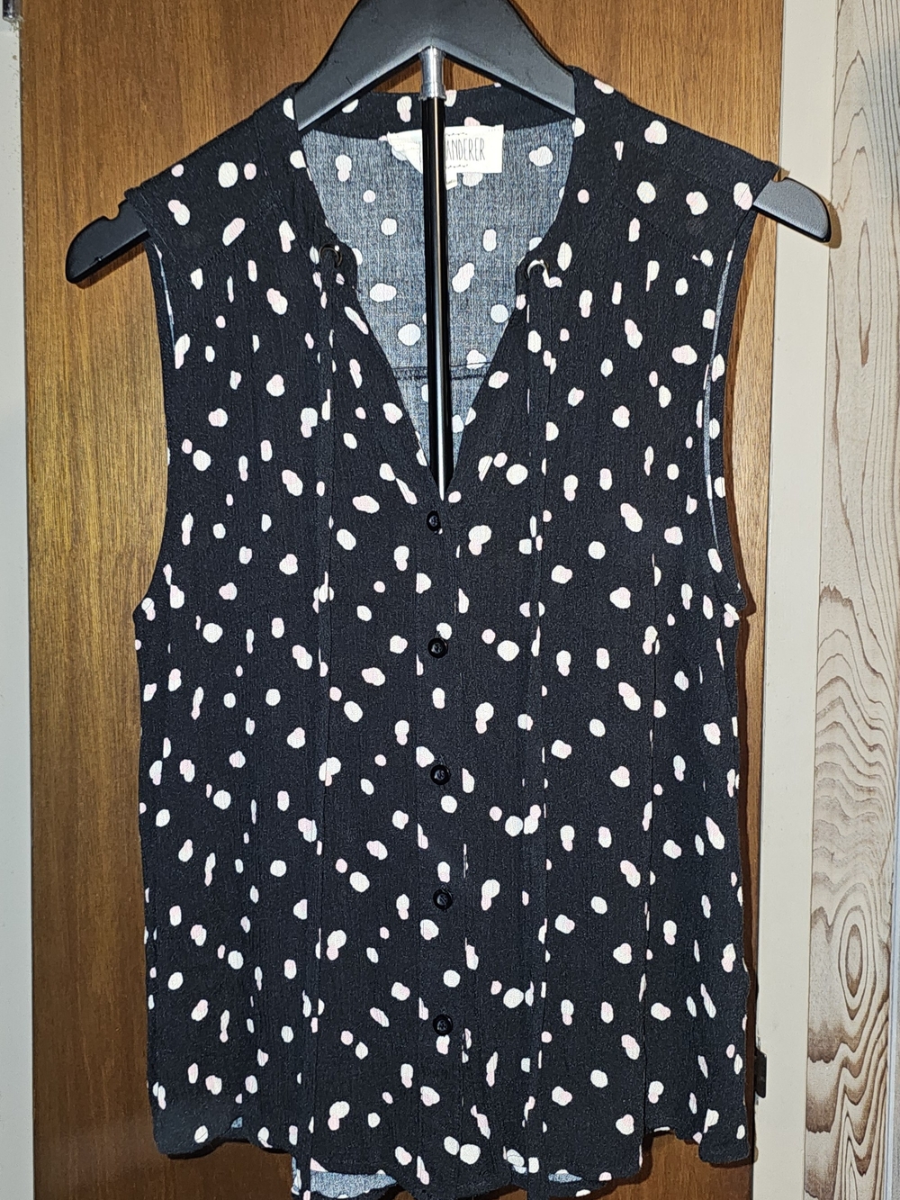 Sweet Wanderer Black Sleeveless Button Tank with Pink Polka Dots